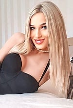 Ukrainian mail order bride Yana from Kiev with blonde hair and blue eye color - image 4