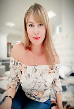 Ukrainian mail order bride Ivanna from Ivano-Frankivsk with white grey hair and green eye color - image 9
