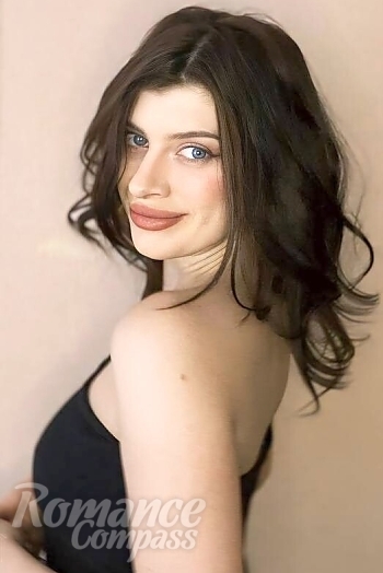 Ukrainian mail order bride Alexandra from Lviv with light brown hair and blue eye color - image 1