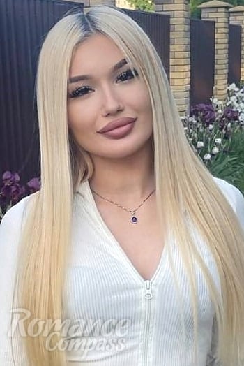 Ukrainian mail order bride Diana from Kyiv with blonde hair and brown eye color - image 1