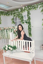 Ukrainian mail order bride Victoria from Kiev with black hair and green eye color - image 7
