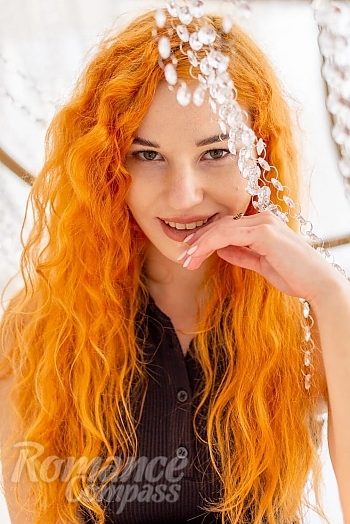 Ukrainian mail order bride Zlatoslava from Kiev with red hair and green eye color - image 1