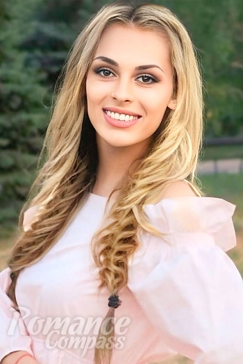 Ukrainian mail order bride Natalia from Prague with blonde hair and brown eye color - image 1
