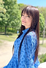 Ukrainian mail order bride Anastasia from Kiev with brunette hair and blue eye color - image 10