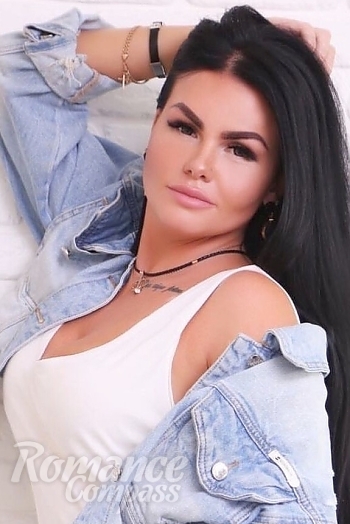 Ukrainian mail order bride Irina from Kyiv with black hair and green eye color - image 1