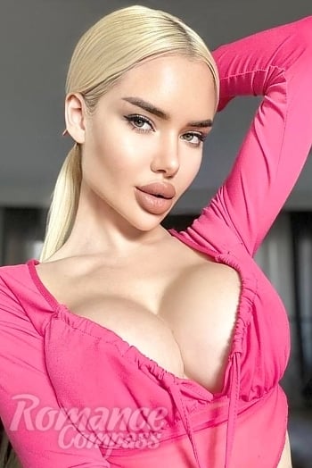 Ukrainian mail order bride Anna from Kiev with blonde hair and hazel eye color - image 1