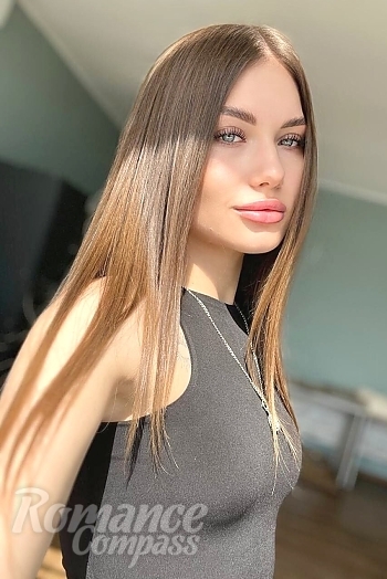 Ukrainian mail order bride Julia from Chernihiv with light brown hair and blue eye color - image 1