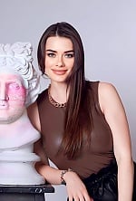 Ukrainian mail order bride Roksolana from New York with brunette hair and green eye color - image 6