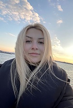 Ukrainian mail order bride Yulia from Kyiv with blonde hair and green eye color - image 8