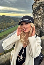 Ukrainian mail order bride Christina from Kiev with blonde hair and black eye color - image 4