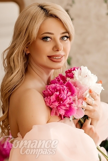 Ukrainian mail order bride Olga from Vinnytsia with blonde hair and grey eye color - image 1