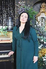 Ukrainian mail order bride Anna from Odessa with black hair and green eye color - image 3