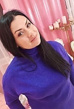 Ukrainian mail order bride Anna from Odessa with black hair and green eye color - image 6