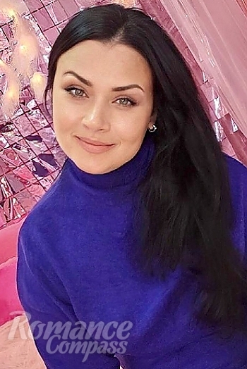Ukrainian mail order bride Anna from Odessa with black hair and green eye color - image 1