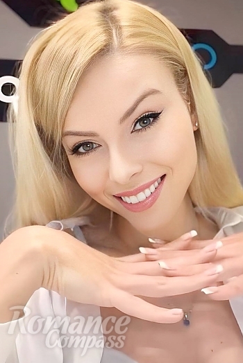 Ukrainian mail order bride Victoria from London with blonde hair and grey eye color - image 1