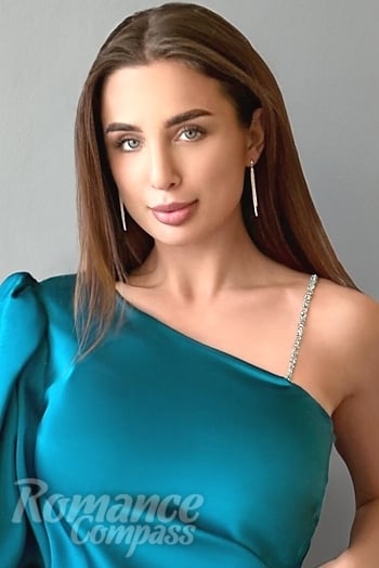 Ukrainian mail order bride Lolita from Kiev with light brown hair and blue eye color - image 1