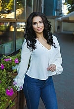 Ukrainian mail order bride Ruslana from Odessa with black hair and green eye color - image 3