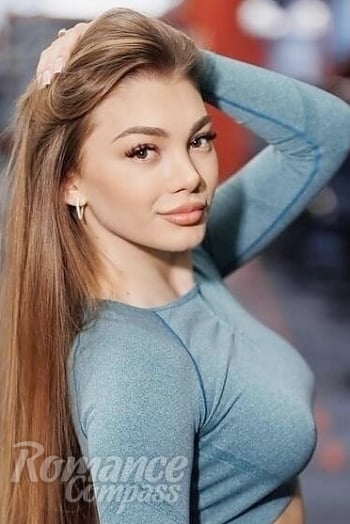 Ukrainian mail order bride Victoria from Chisinau with light brown hair and brown eye color - image 1