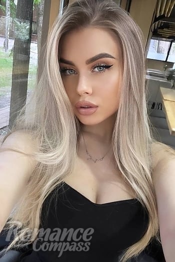 Ukrainian mail order bride Ivanna from Kyiv with blonde hair and green eye color - image 1