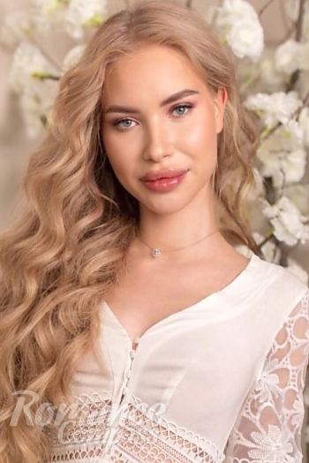 Ukrainian mail order bride Lada from Kyiv with blonde hair and blue eye color - image 1