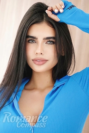 Ukrainian mail order bride Isabella from Cali with black hair and blue eye color - image 1