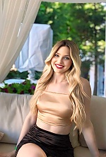 Ukrainian mail order bride Anna from Kiev with blonde hair and green eye color - image 5