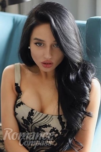 Ukrainian mail order bride Adelina from Lviv with black hair and grey eye color - image 1