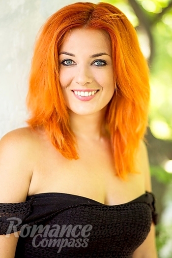 Ukrainian mail order bride Olga from Nikolaev with red hair and blue eye color - image 1