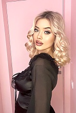 Ukrainian mail order bride Anastasia from Lviv with blonde hair and green eye color - image 4