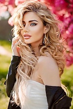 Ukrainian mail order bride Anastasia from Berlin with black hair and blue eye color - image 2