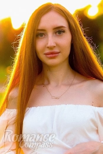 Ukrainian mail order bride Alina from Cherkasy with red hair and blue eye color - image 1