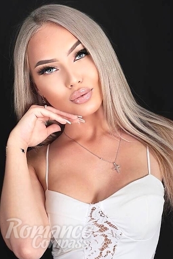 Ukrainian mail order bride Nadezhda from Valencia with blonde hair and blue eye color - image 1