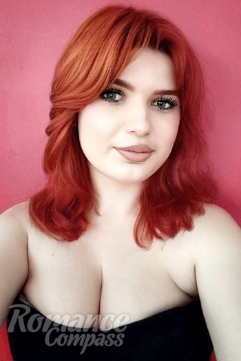 Ukrainian mail order bride Olha from Cherkasy with red hair and green eye color - image 1