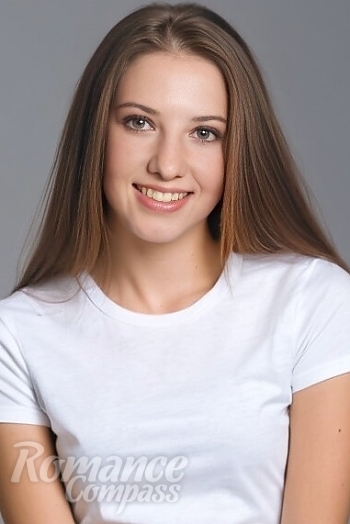 Ukrainian mail order bride Ruslana from Kyiv with light brown hair and brown eye color - image 1