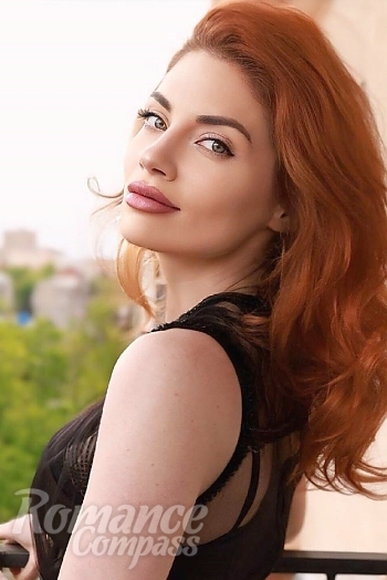 Ukrainian mail order bride Kristina from Kharkiv with red hair and green eye color - image 1