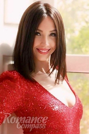 Ukrainian mail order bride Inna from Kyiv with brunette hair and green eye color - image 1