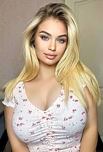 Ukrainian mail order bride Sofia from Kyiv with blonde hair and blue eye color - image 4