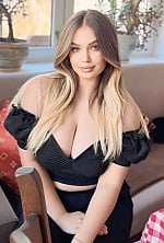 Ukrainian mail order bride Sofia from Kyiv with blonde hair and blue eye color - image 8