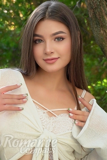 Ukrainian mail order bride Liliia from Cherkasy with light brown hair and hazel eye color - image 1