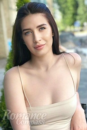 Ukrainian mail order bride Myroslava from Cherkasy with light brown hair and blue eye color - image 1