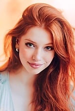 Ukrainian mail order bride Yevheniia from Ternopil with red hair and green eye color - image 3