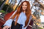 Ukrainian mail order bride Anastasiia from Kyiv with red hair and green eye color - image 8