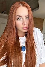 Ukrainian mail order bride Anastasiia from Kyiv with red hair and green eye color - image 9