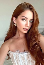 Ukrainian mail order bride Anastasiia from Kyiv with red hair and green eye color - image 10