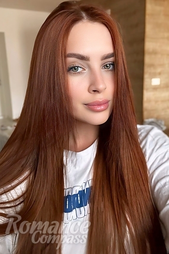 Ukrainian mail order bride Anastasiia from Kyiv with red hair and green eye color - image 1