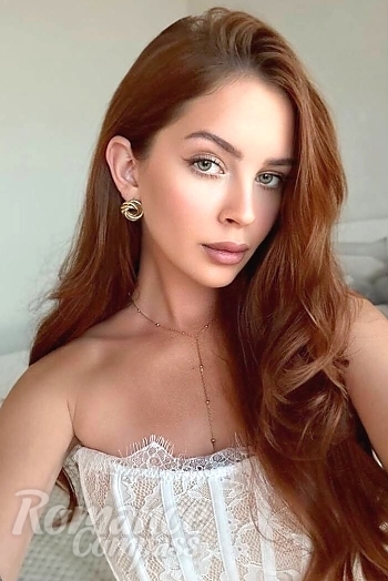 Ukrainian mail order bride Anastasiia from Kyiv with red hair and green eye color - image 1