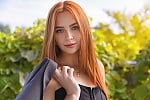 Ukrainian mail order bride Anastasiia from Kyiv with red hair and green eye color - image 7