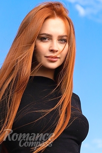 Ukrainian mail order bride Anastasiia from Kyiv with red hair and green eye color - image 1