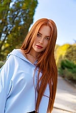 Ukrainian mail order bride Anastasiia from Kyiv with red hair and green eye color - image 3