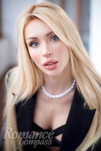 Ukrainian mail order bride Zlata from Kiev with blonde hair and blue eye color - image 1